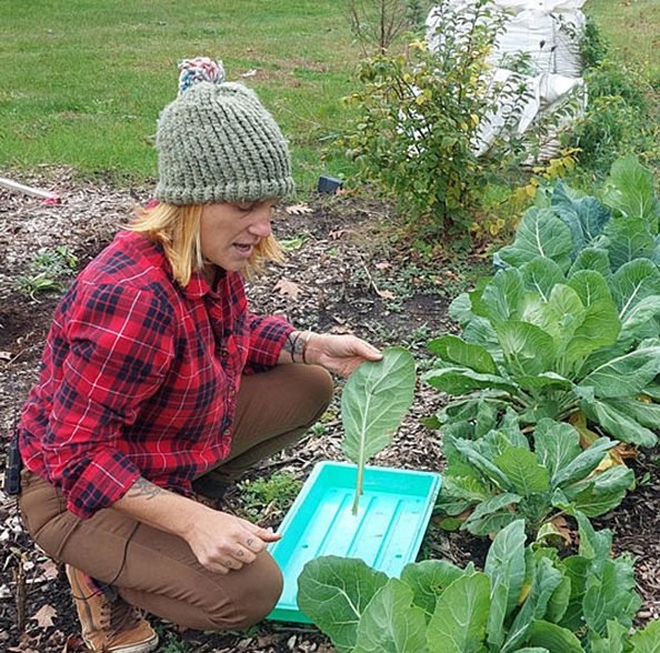 Ashley Kenney in the Permaculture Garden
