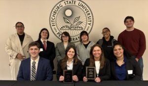 WCSU’s Moot Court team flanked by their assistant coaches at the Eastern Regional Tournament in Fitchburg, Massachusetts. Back row (l-r): Nakita Singh, Gianna Ruby-DaSilva, Olivia Burroughs, Minhee Mok, Alexa Jones, Vincent Trombetto; front row (l-r): Justin Shapiro, Julia Meadows, Grace Parkosewich, Yaritza Santana-Jimenez